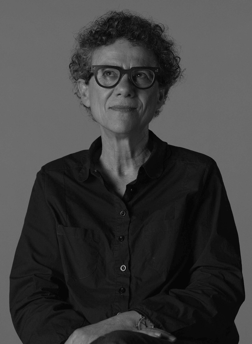 A black and white portrait of filmmaker Ana Kokkinos.