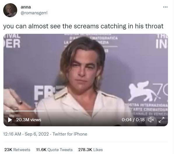 An image of a white man with jaw-length blonde hair at a press conference, staring blankly into space. It's a screenshot of a Tweet that reads 'you can almost see the screams catching in his throat'
