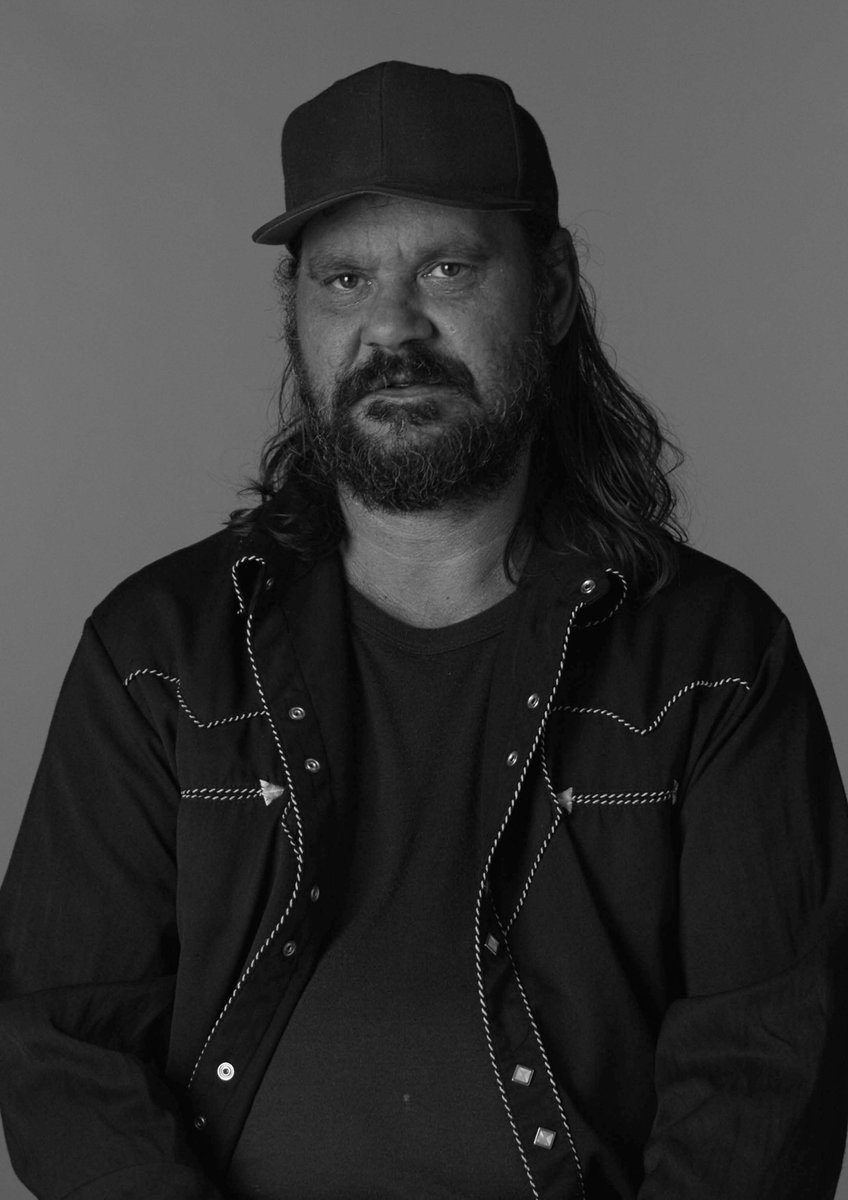 A black and white picture of the filmmaker Warwick Thornton