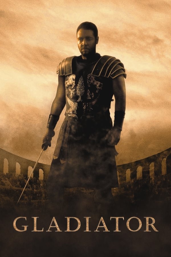 A man dressed in gladiator armour with a sword in his hand standing against a moody, orange backdrop of a Roman arena from antiquity