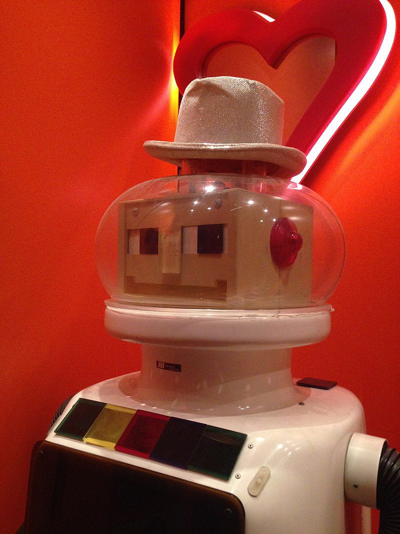 A picture of a robot on a red background