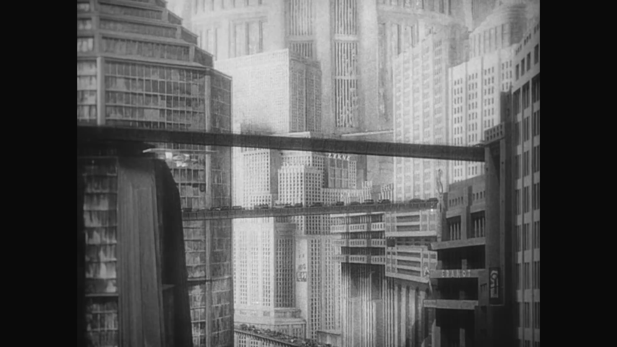 A black and white image of a futuristic city