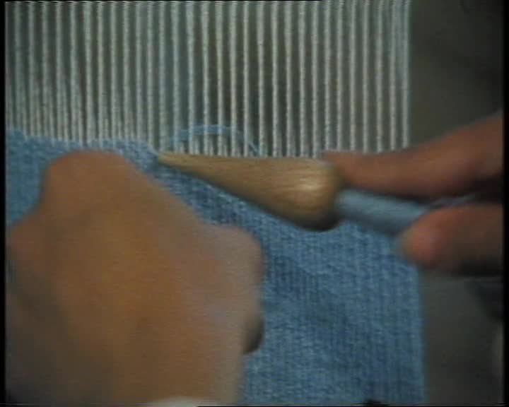 A still image from A Tapestry workshop with Archie Brennan