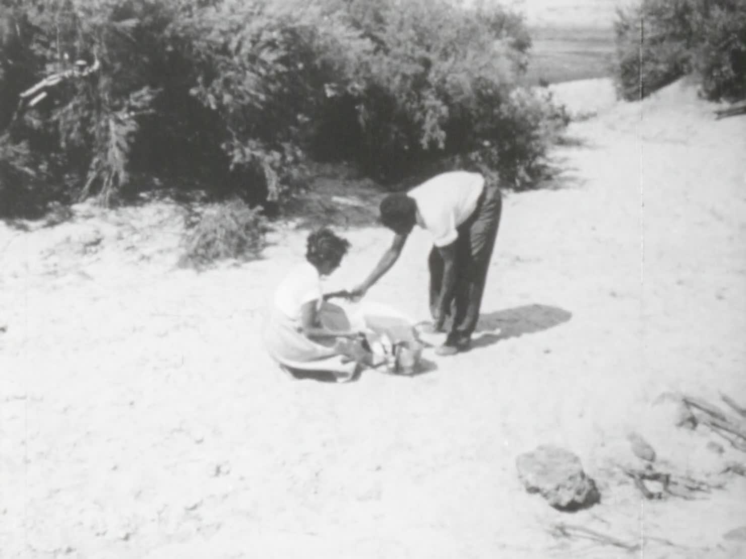 Lily feeds a baby thumbnail image.